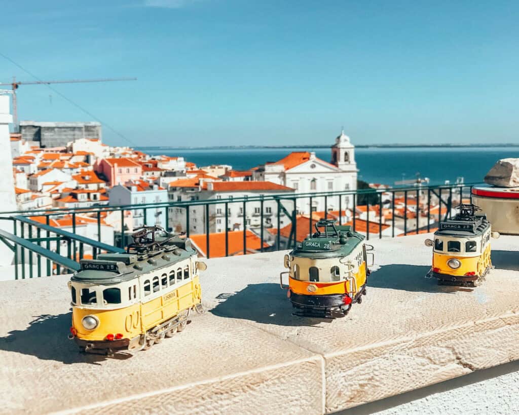 Tram 28 on a cobblestone street in Lisbon